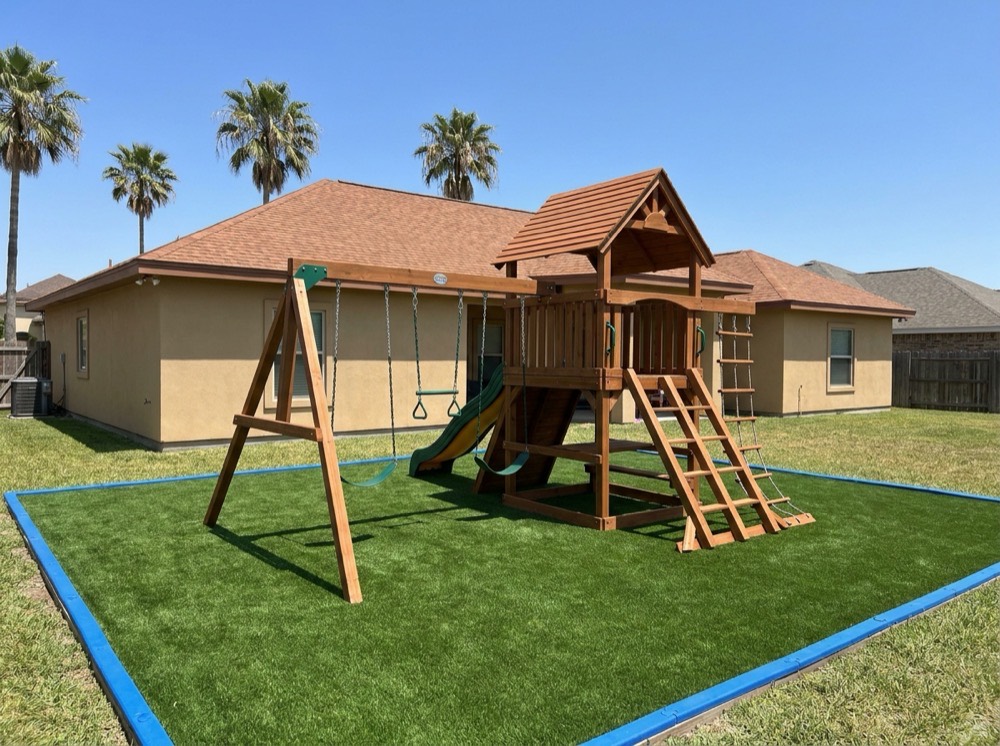 Playground area with soft artificial safety turf in Pharr Texas